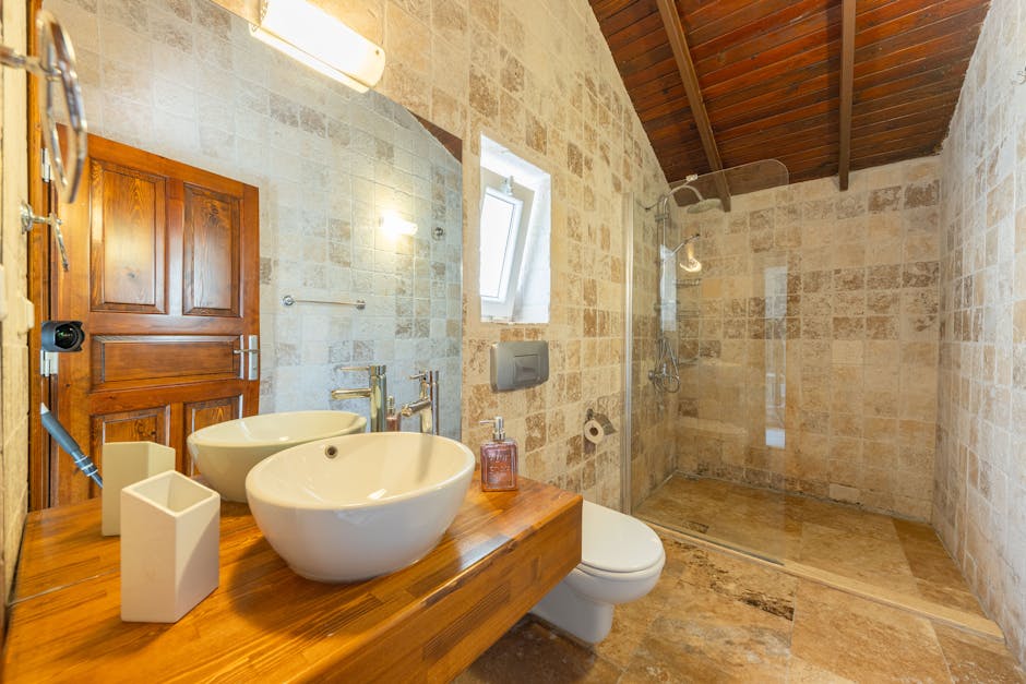 A bathroom with a sink and a toilet