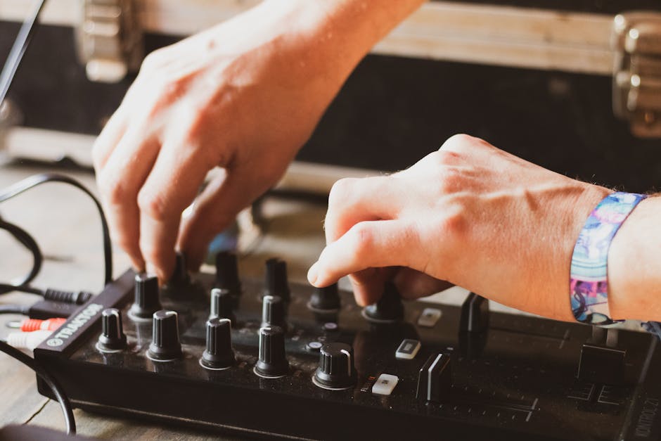 Dj making tune with musical equipment