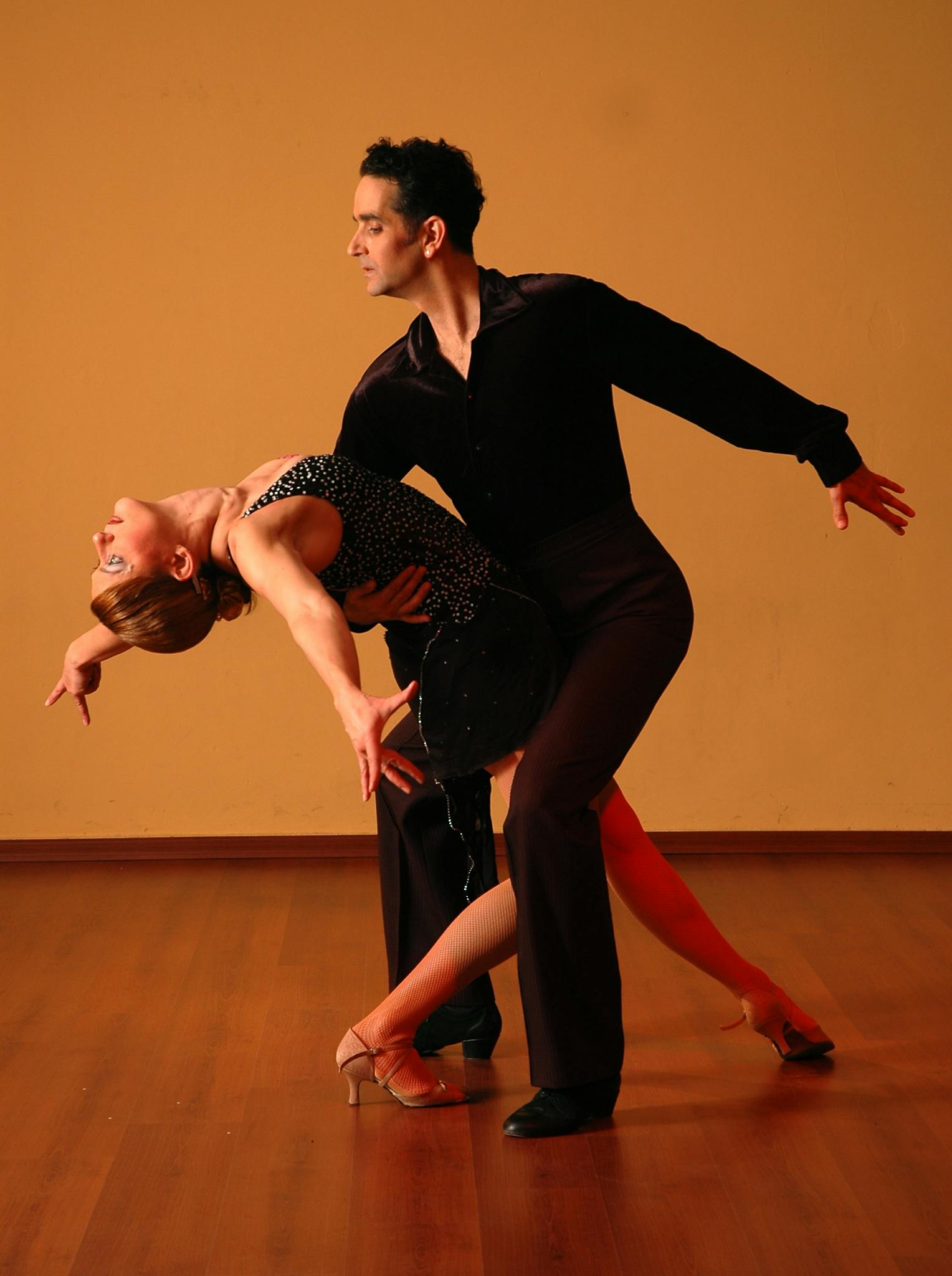 Grayscale Photo of Woman Dancing