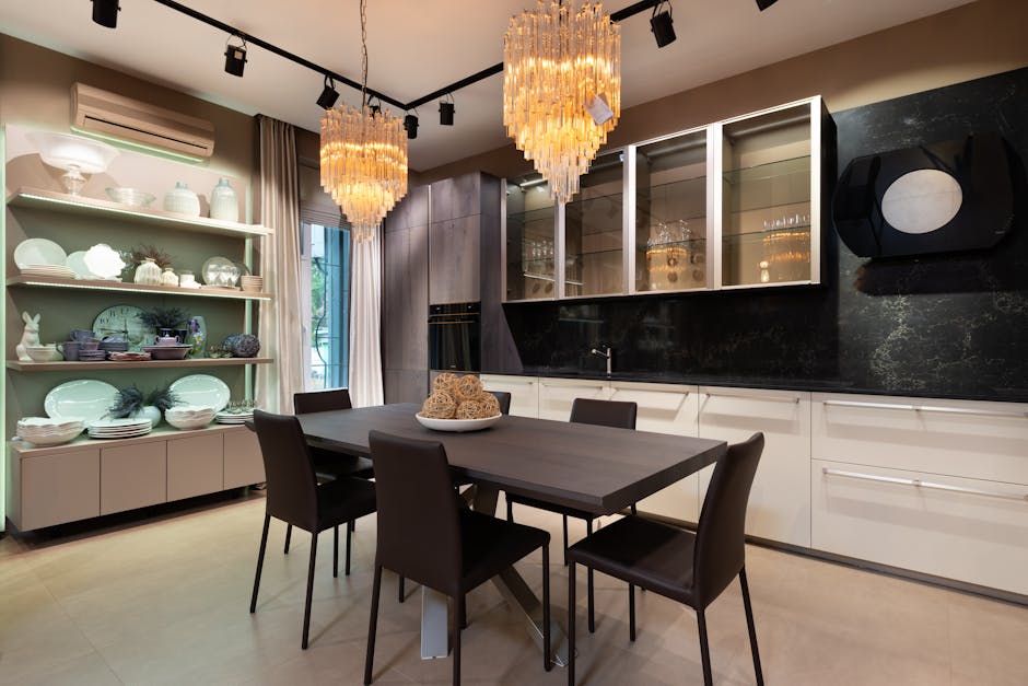 Stylish interior of modern kitchen with crystal chandeliers and wooden furniture