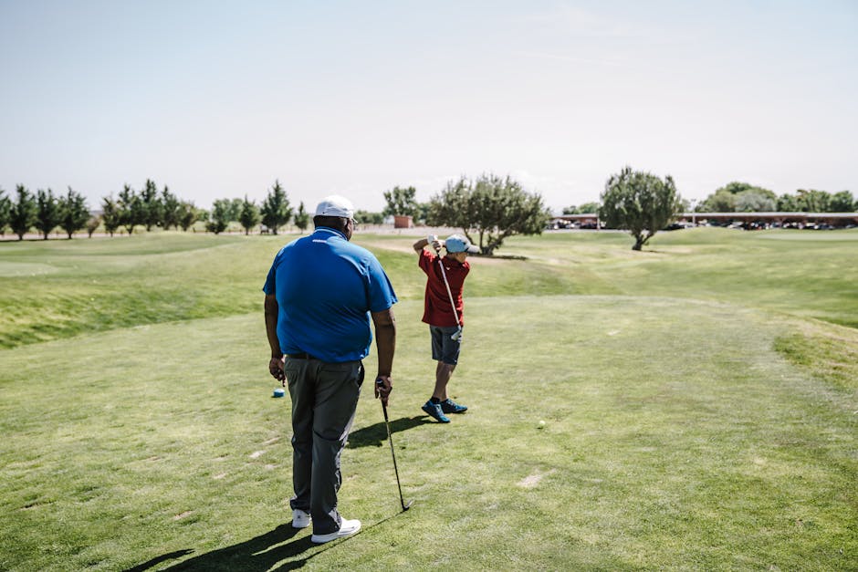 Man Wearing Red Shirt Playing Golf