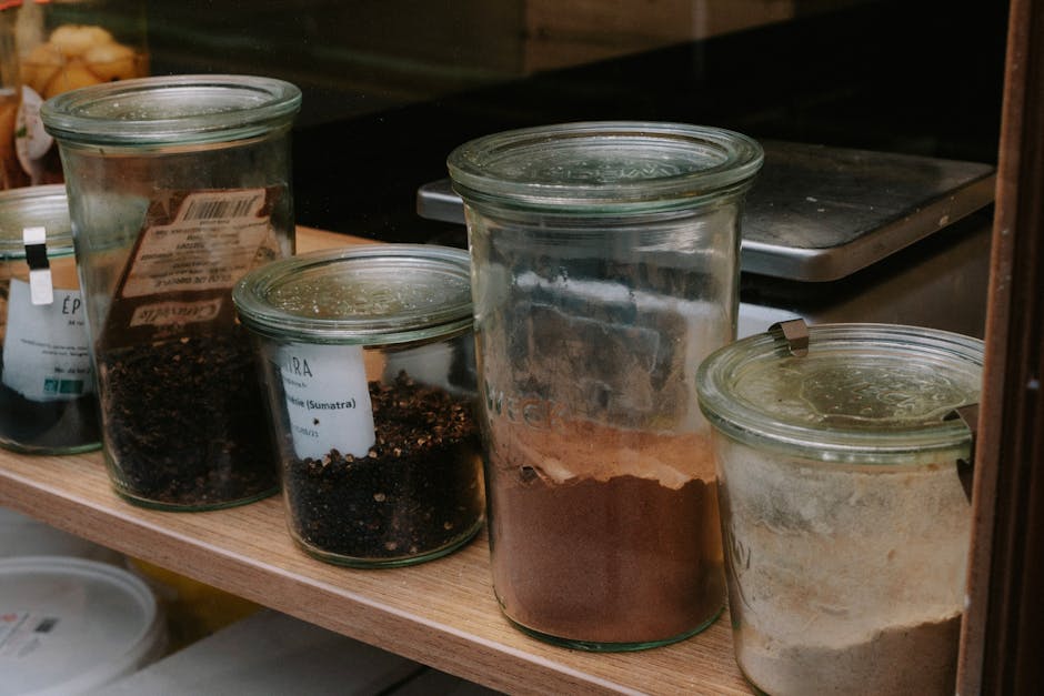 Jars of Spices on a Shelf