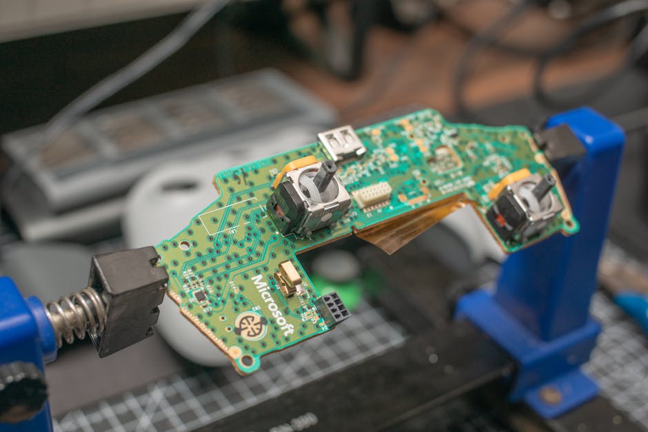 A close up of a circuit board with wires