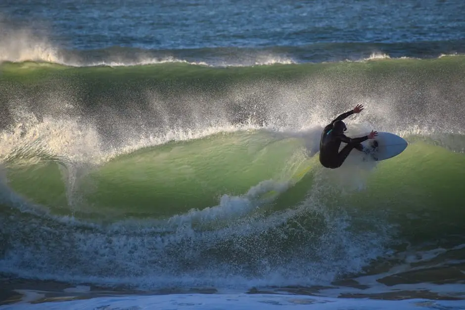 A surfer is riding a wave in the ocean