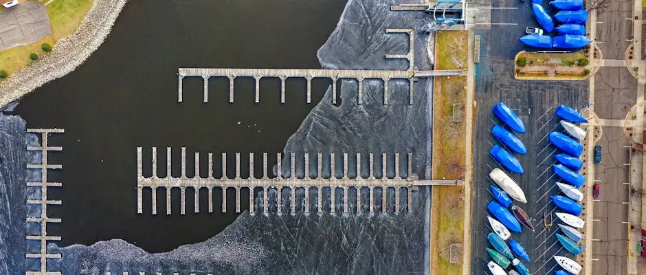 Overhead view of marina docks and covered boats at Lake City, highlighting the nautical landscape.