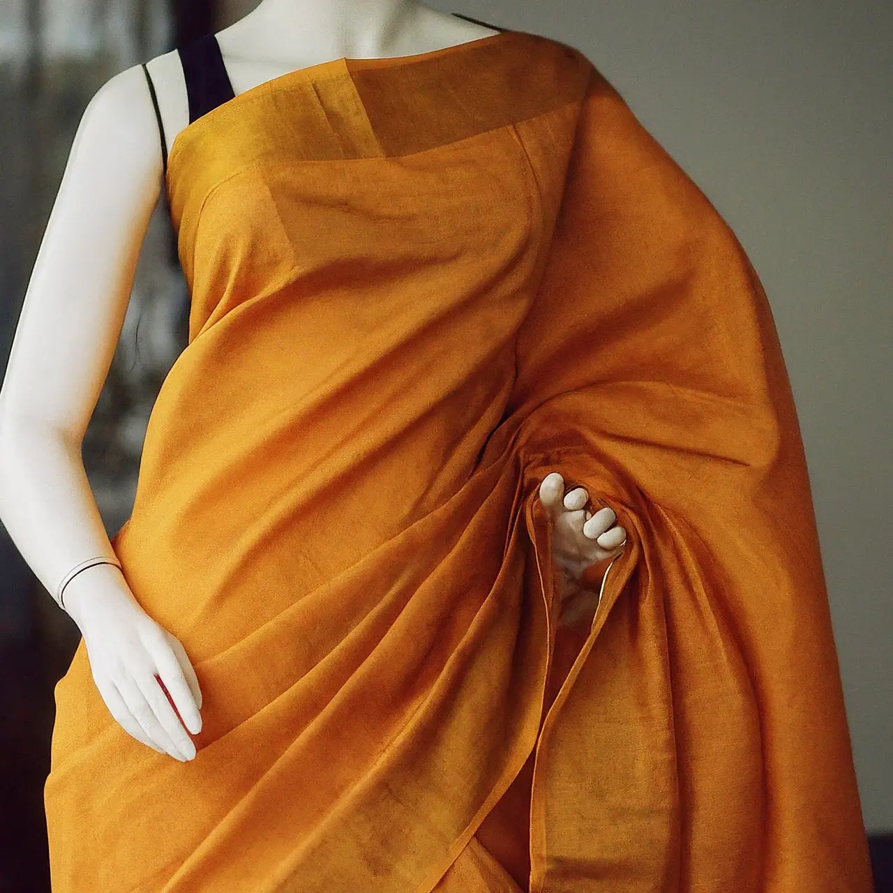 Elegant handloom saree draped on a mannequin. 35mm stock photo