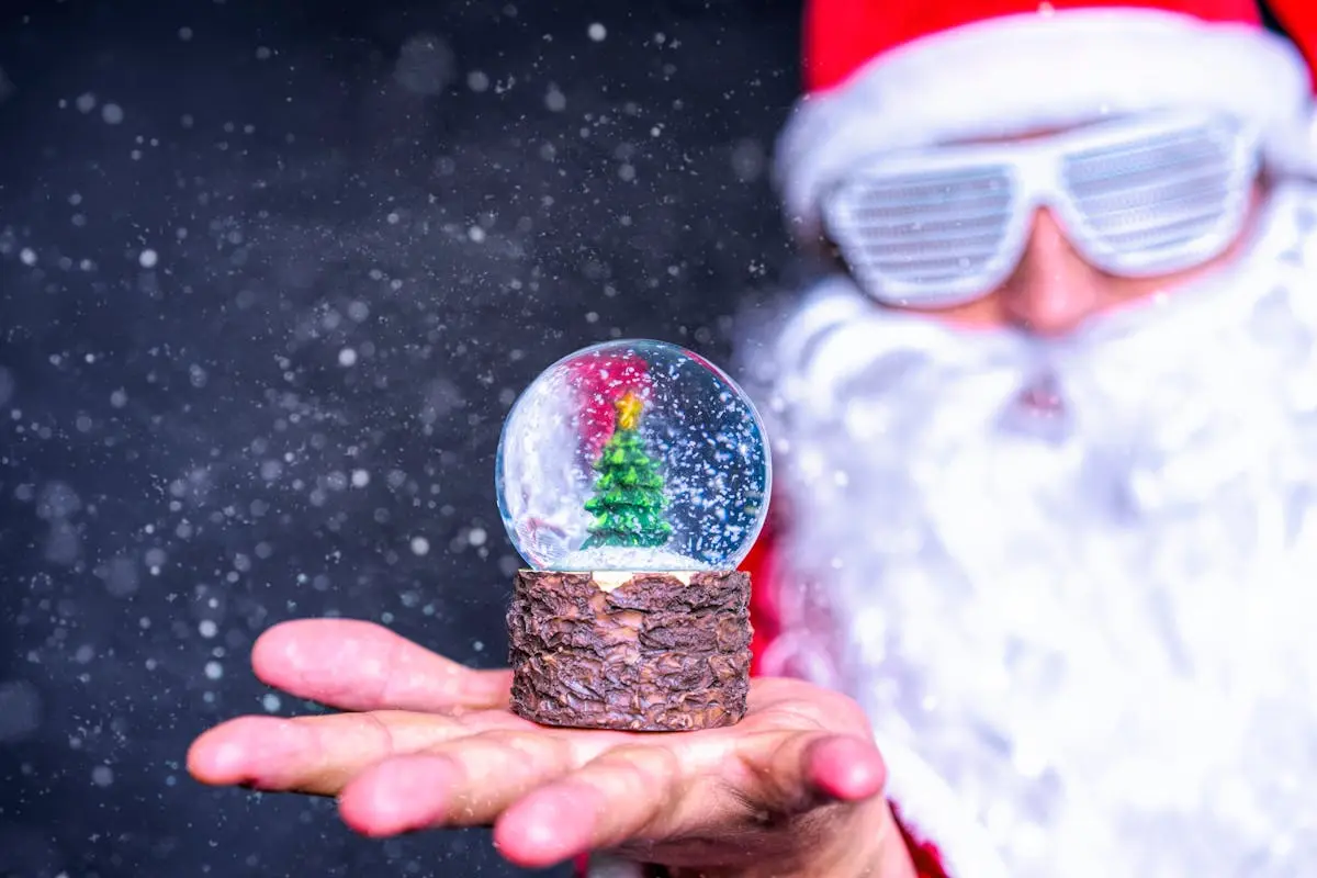 Shallow Focus Photo of Crystal Ball on Person’s Hand