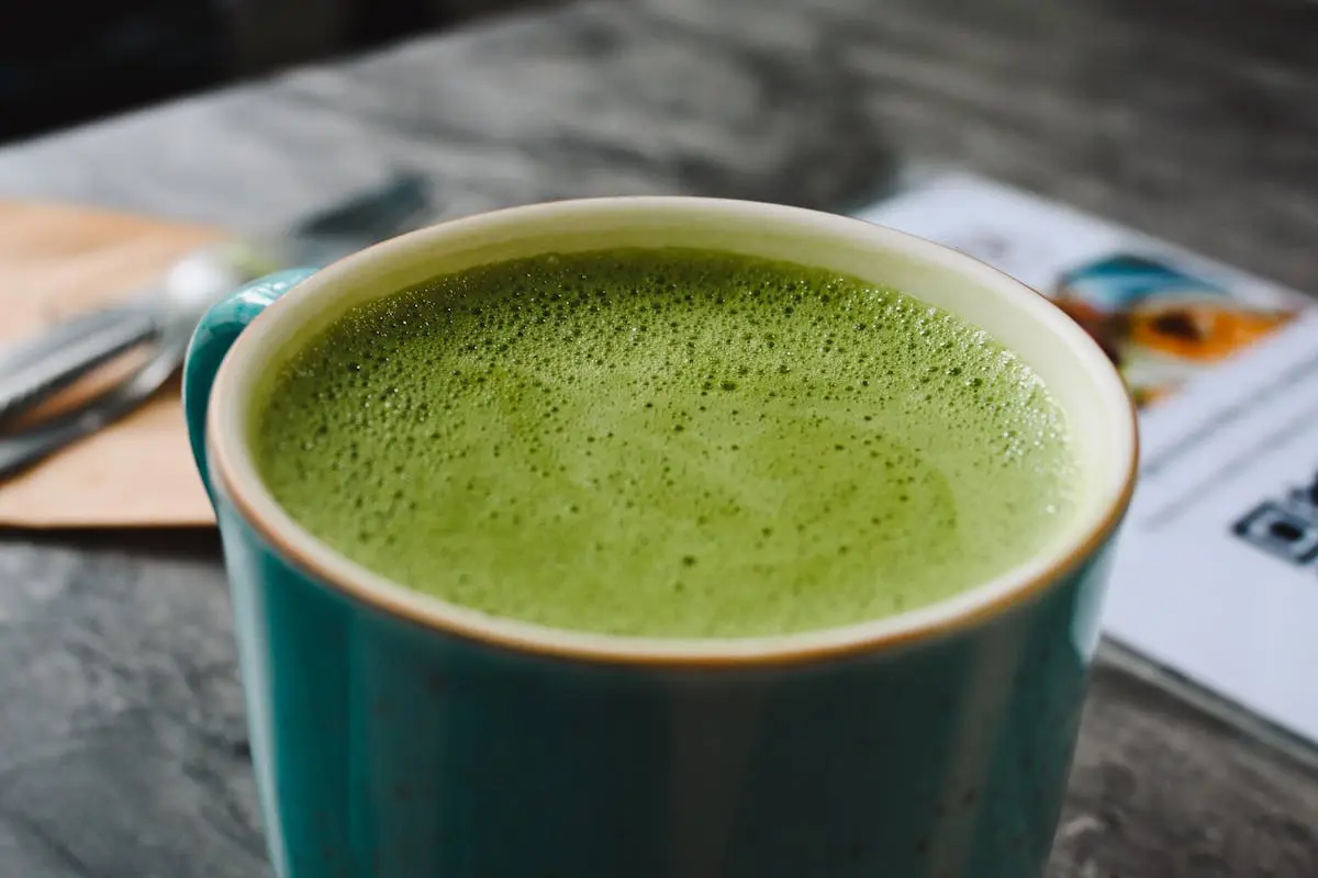 Matcha Latte in a Green Ceramic Cup 
