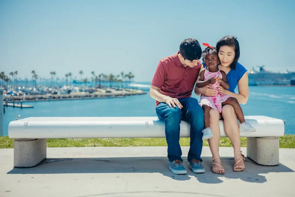 Happy Family sitting near Bay