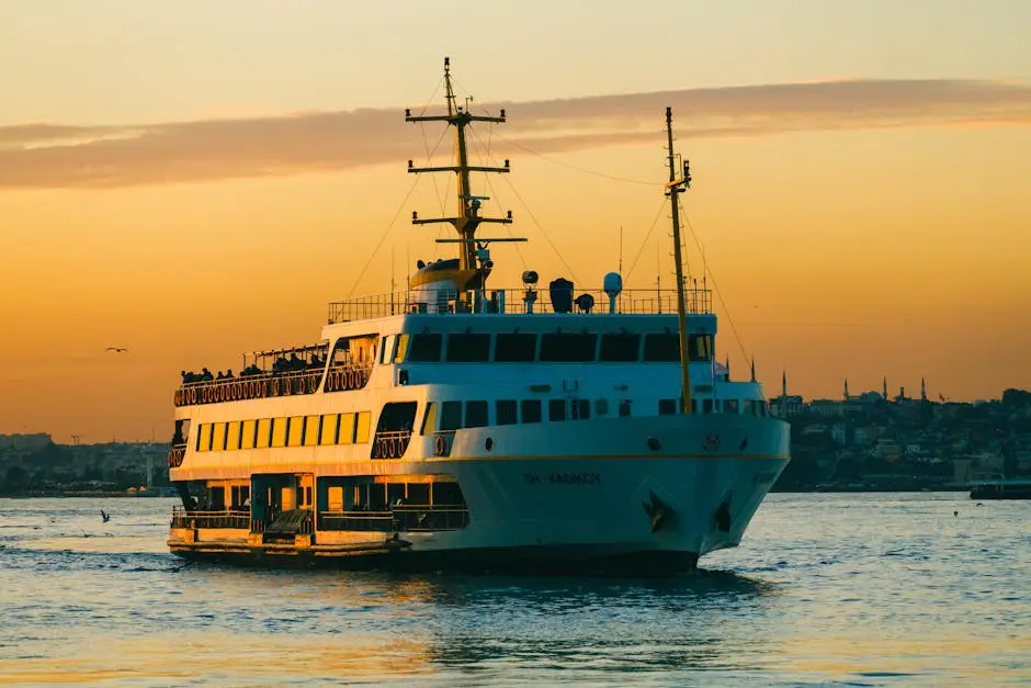 A vibrant sunset over Istanbul’s Bosphorus Strait with a ferry sailing calmly, capturing the essence of Turkish travel.