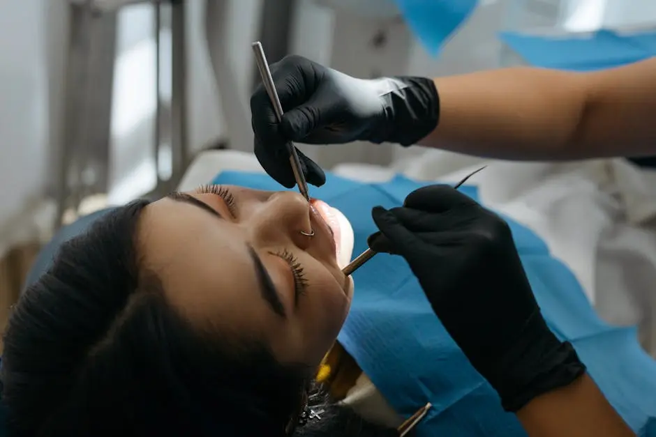 Close-up Photo of Dentist Examining Patient’s Teeth