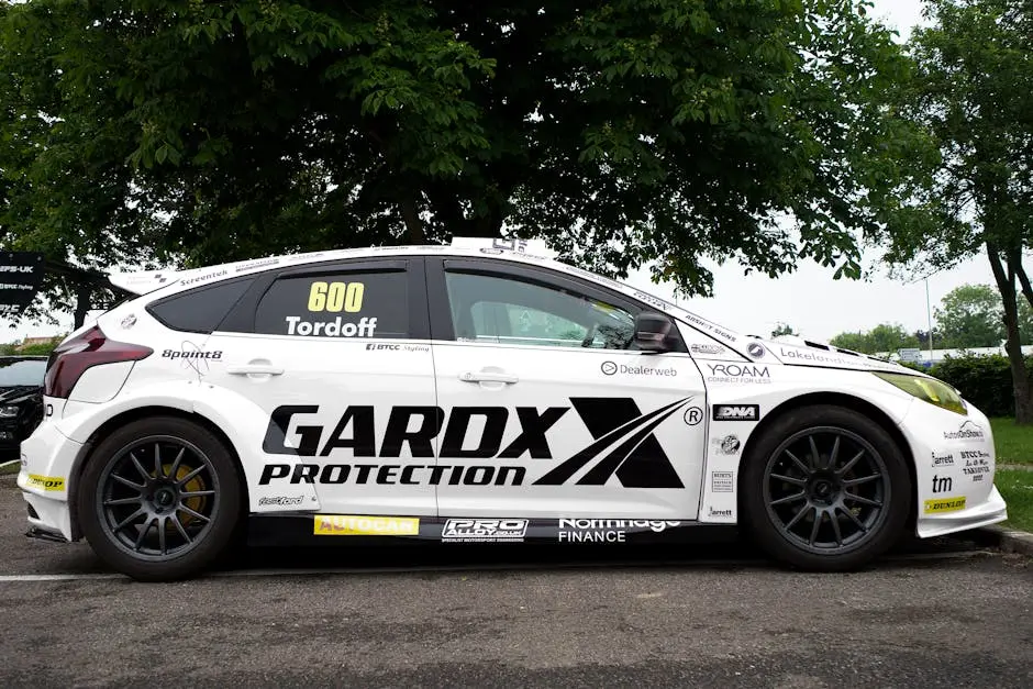 White Ford Focus RS with Stickers Parked on a Parking Lot