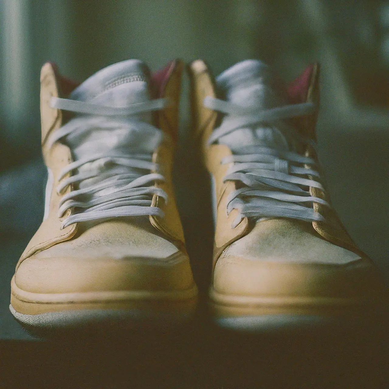 A pair of worn Air Jordans before restoration. 35mm stock photo