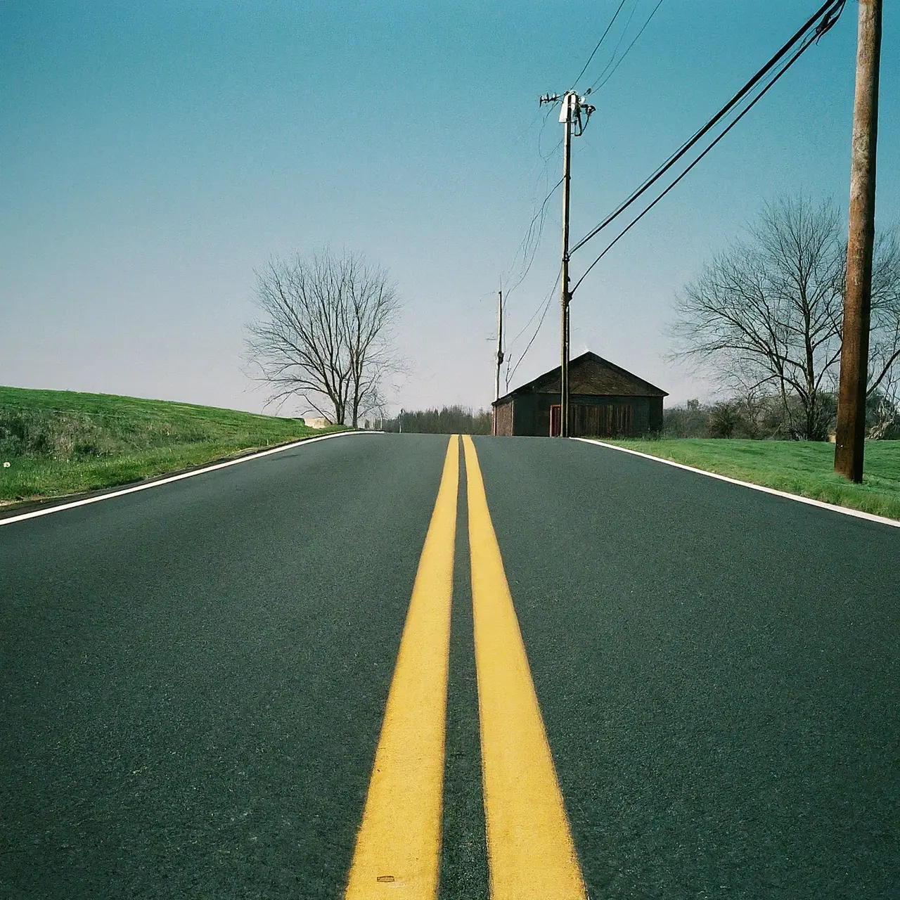 An asphalt road in South Jersey with clear weather. 35mm stock photo