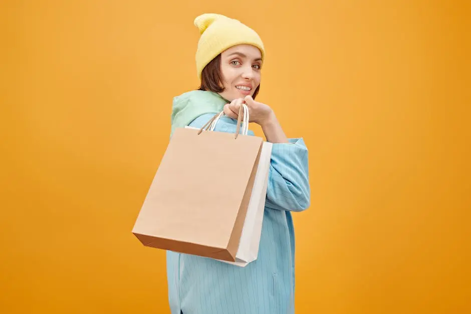 Woman Wearing Yellow Beanie Holding Shopping Bags