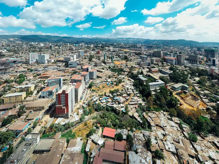 A stunning aerial shot showcasing Nairobi’s skyline, balancing urban architecture with natural landscapes.