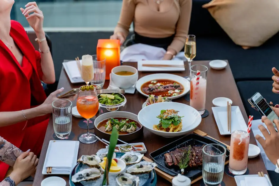 Chic outdoor dining in Dubai featuring diverse dishes, cocktails, and a warm atmosphere.