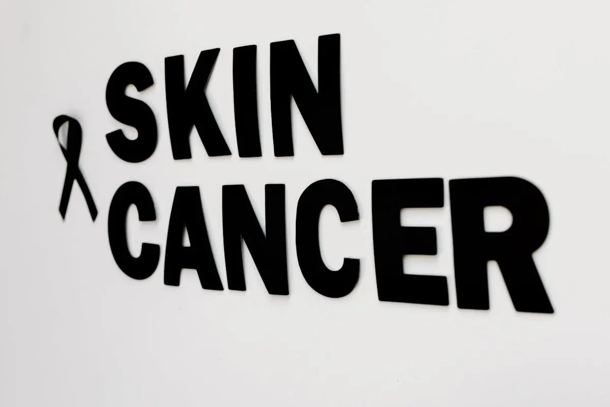 Close-up of a Black Sign Saying “Skin Cancer”