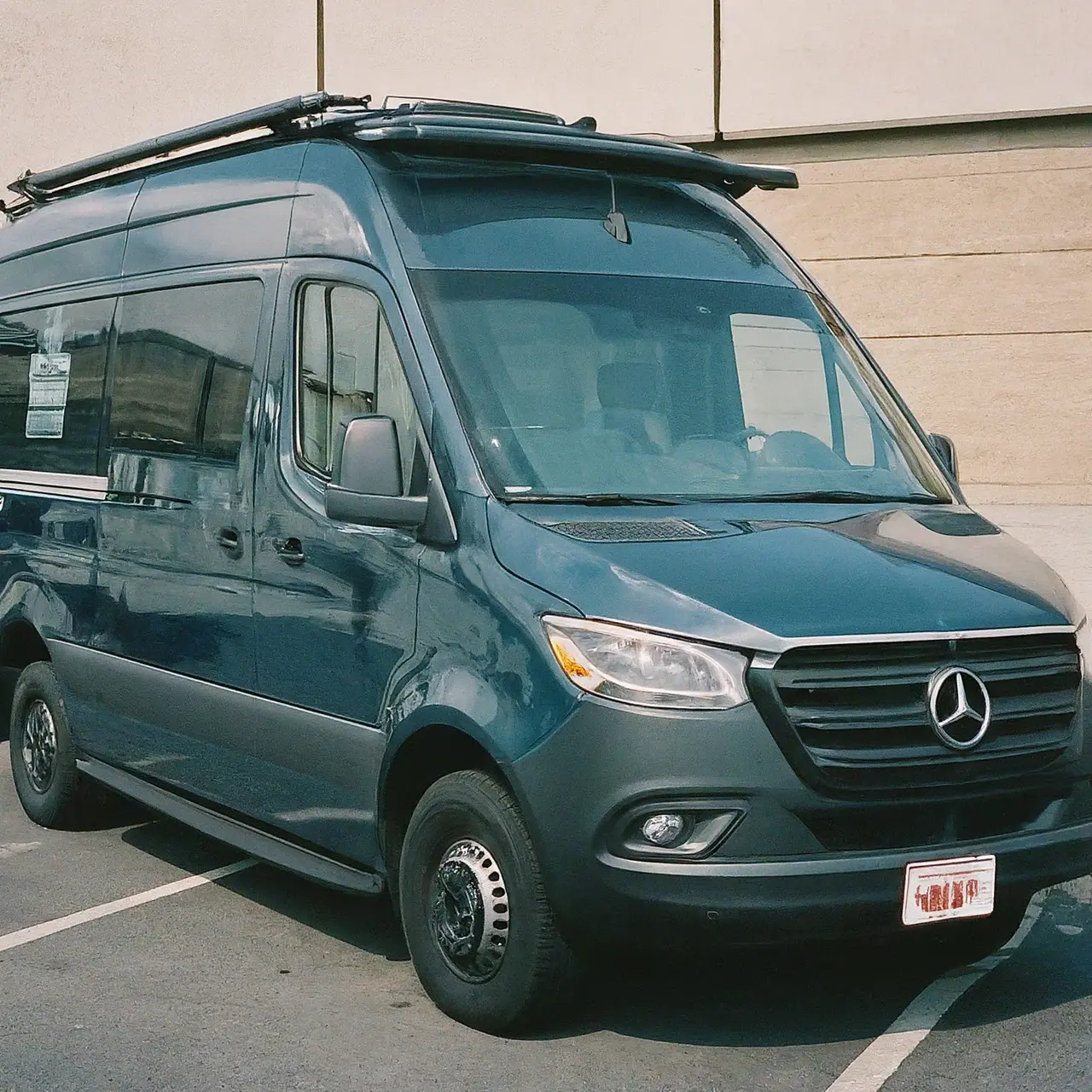 A wheelchair accessible van parked outside a healthcare facility. 35mm stock photo