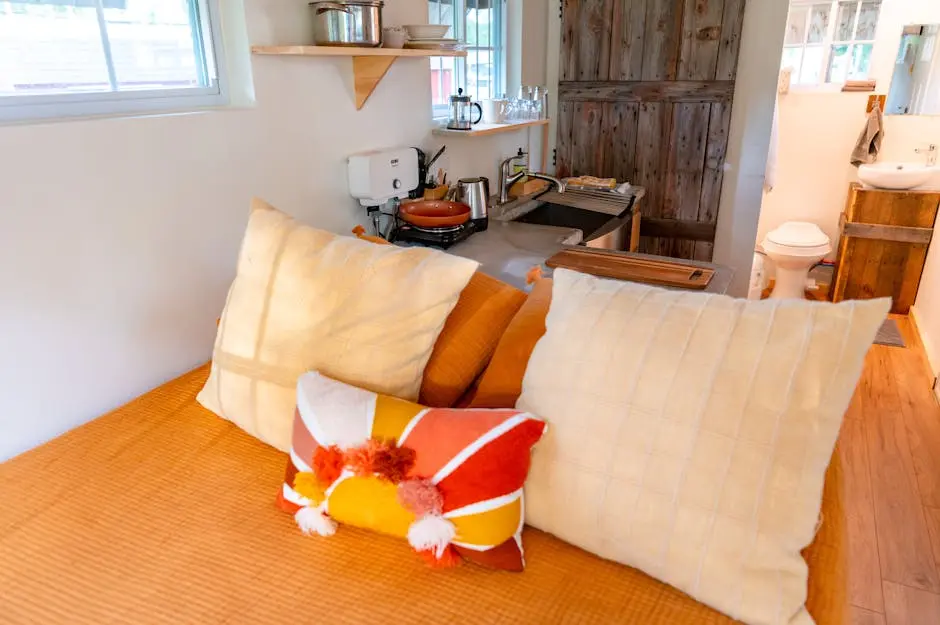 A cozy modern bedroom with rustic decor, featuring pillows and vibrant colors in NY, USA.