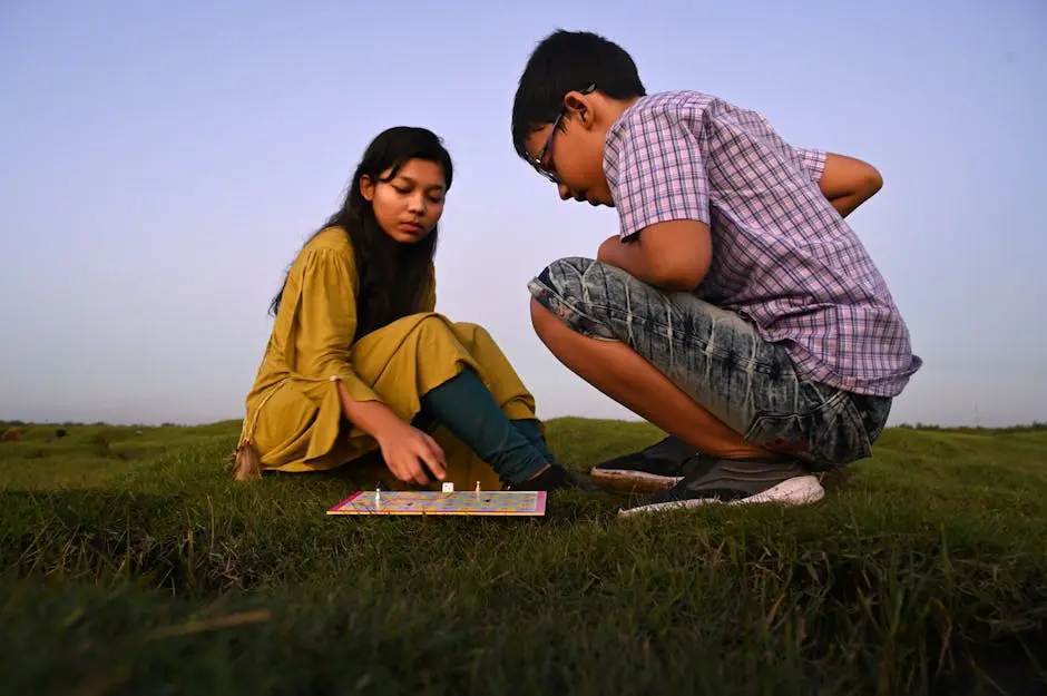 Kids Playing Board Game on Grass