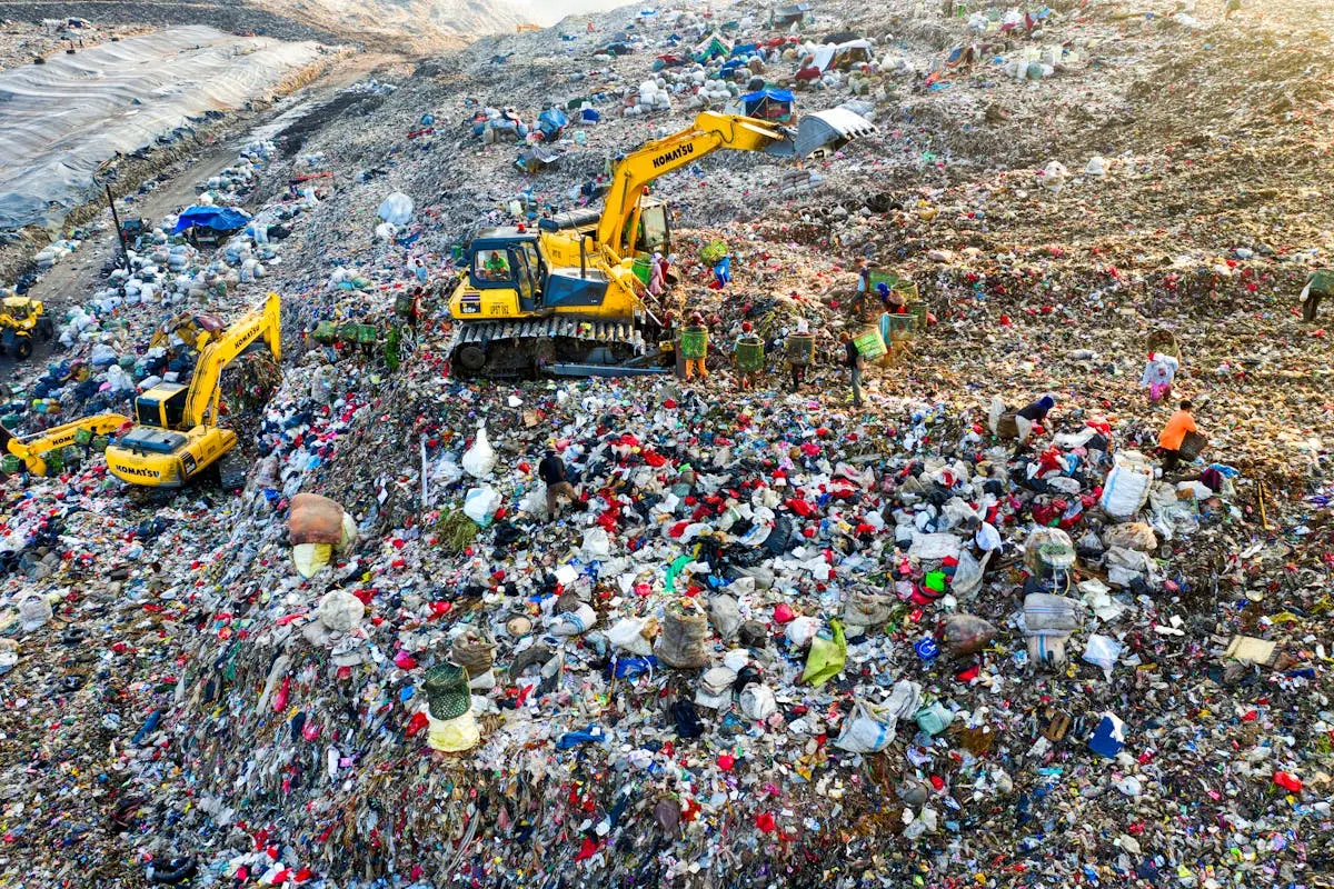 Drone view of landfill operations in West Java highlighting waste management challenges.