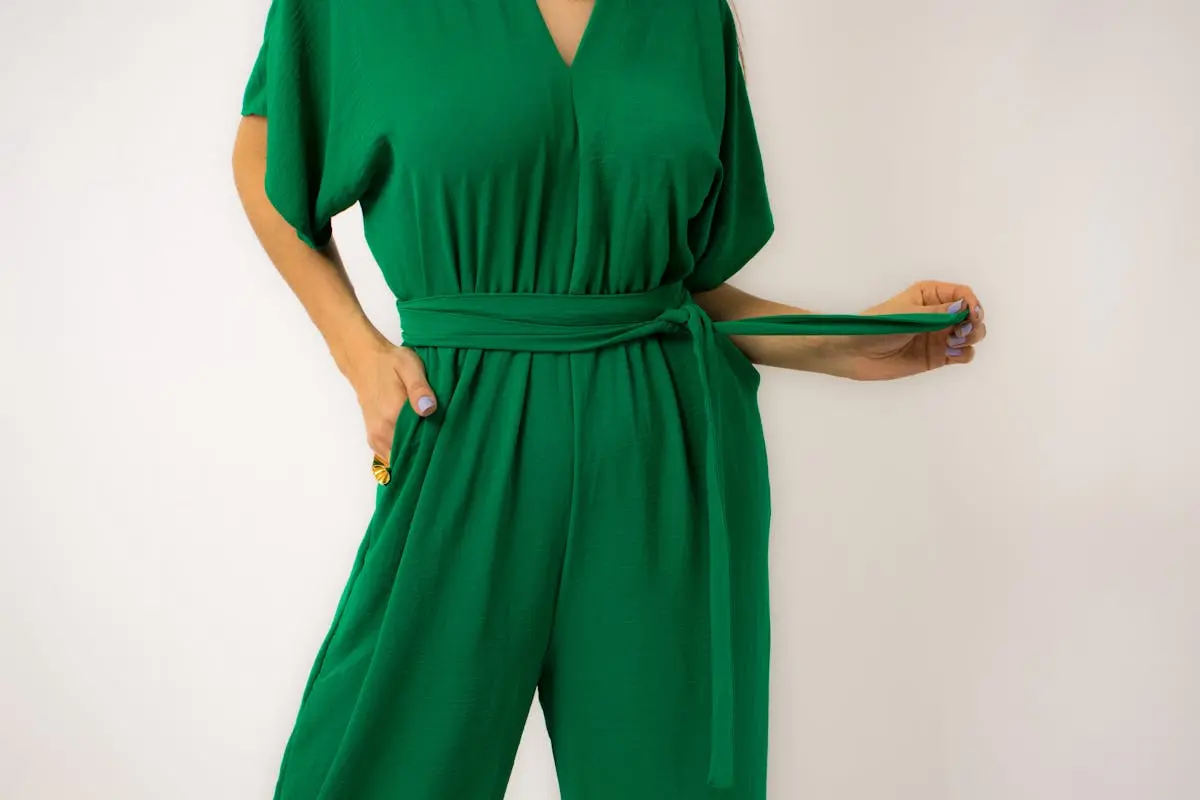 Woman Posing in Bright Green Jumpsuit with a Belt