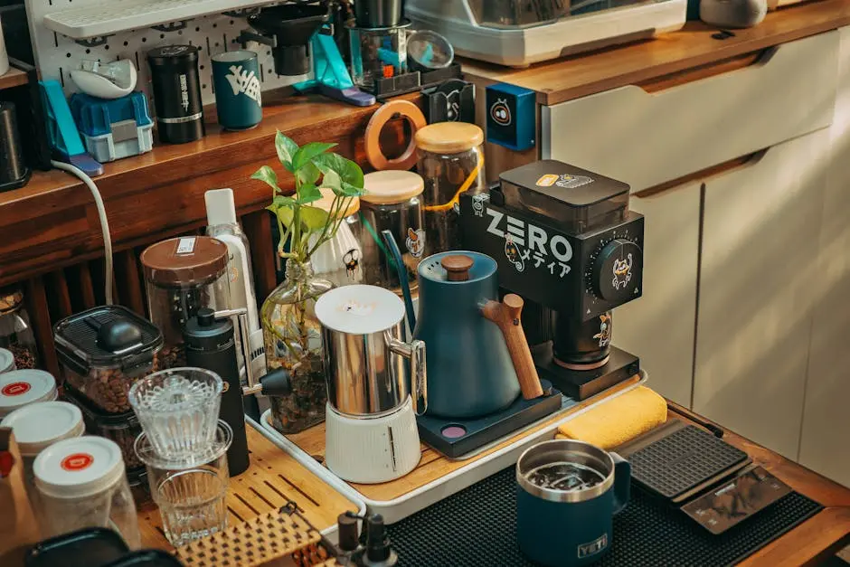 A detailed coffee station setup featuring grinders, mugs, and brewing tools in a cozy indoor setting.