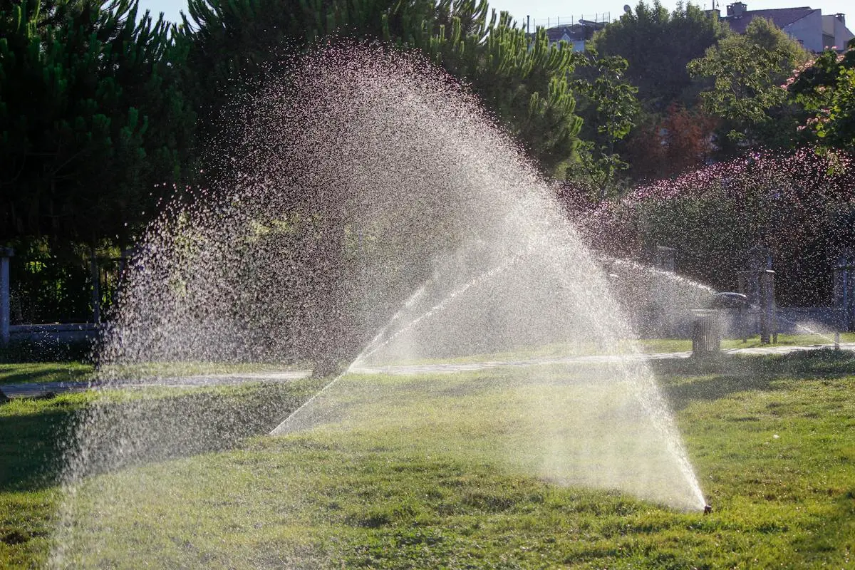 Water Sprinklers on Green Grass