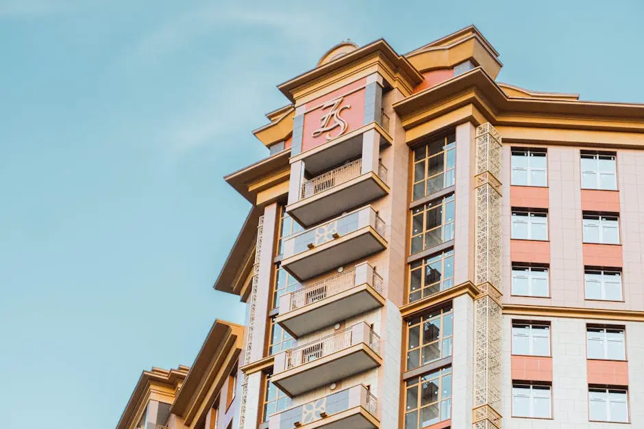 modern high-rise building with ornate balconies and clear sky