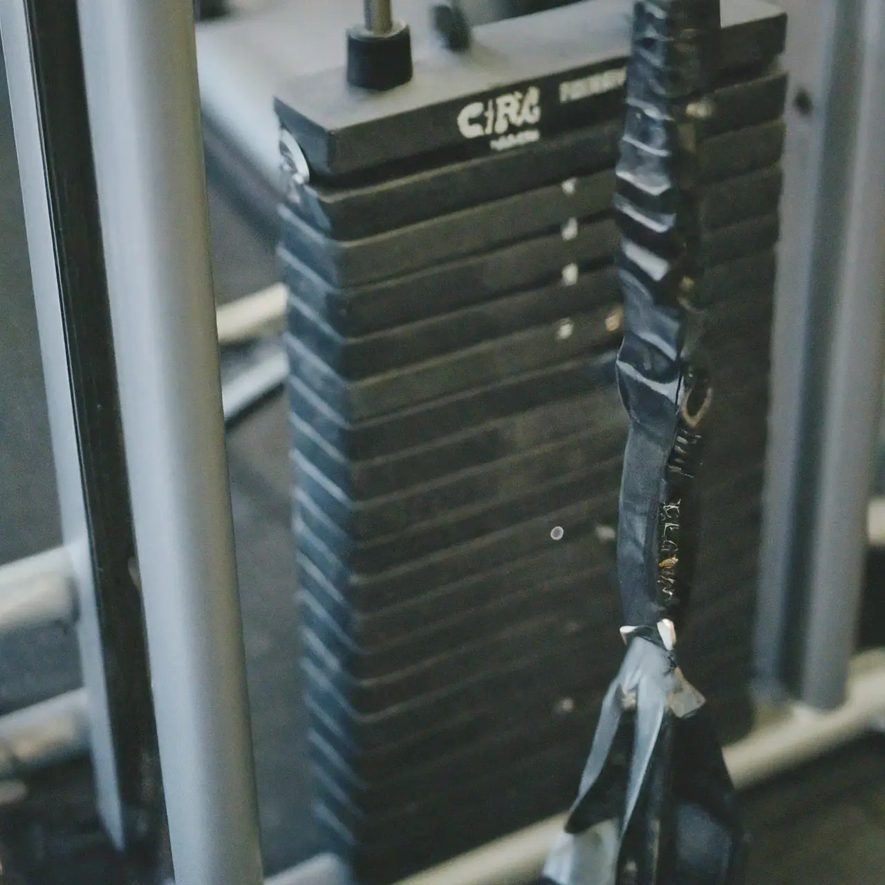 Close-up of a gym machine’s belt and tools. 35mm stock photo