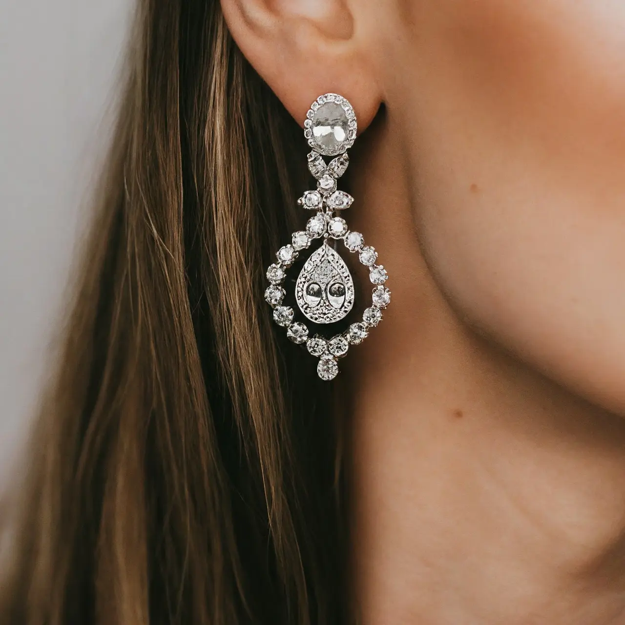 Elegant 2 carat diamond earrings on a velvet jewelry box. 35mm stock photo