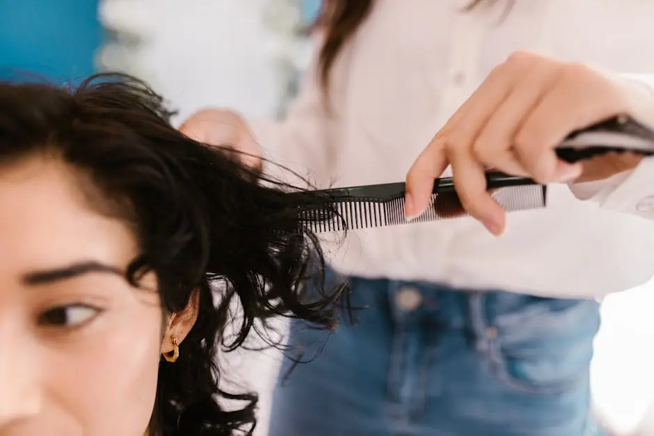 A Woman in Blue Denim Jeans Holding a Hair Comb