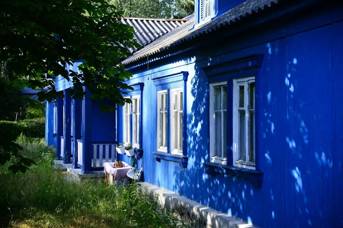 A blue house with a window