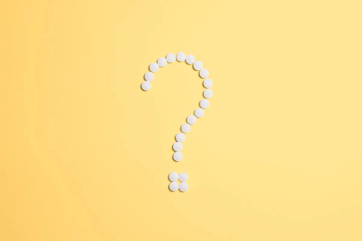 Pills Fixed as Question Mark Sign