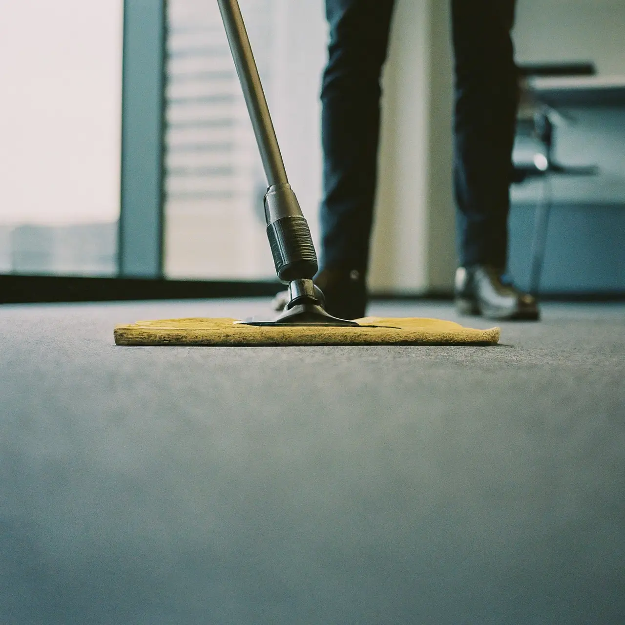 Commercial cleaning equipment on a freshly cleaned office floor. 35mm stock photo