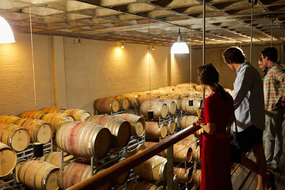 Photo of People in a Room with Barrels