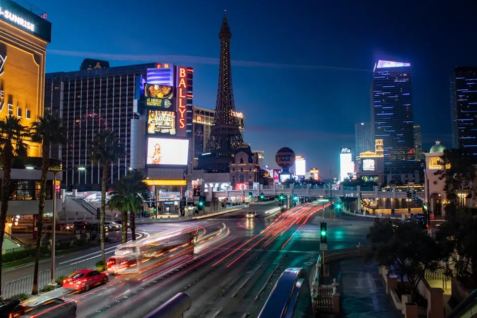 Captivating night view of Las Vegas Strip with vibrant traffic and iconic hotels.