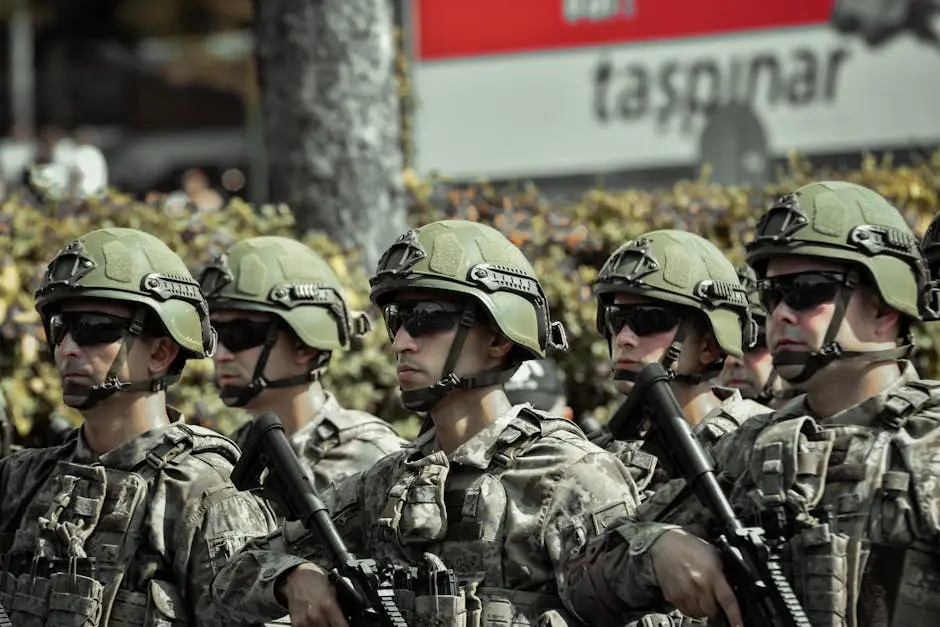 A group of soldiers in uniform march down the street