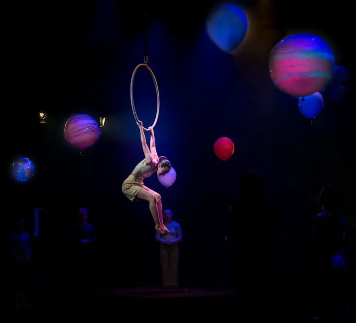 Acrobat Hanging on Ring in Circus