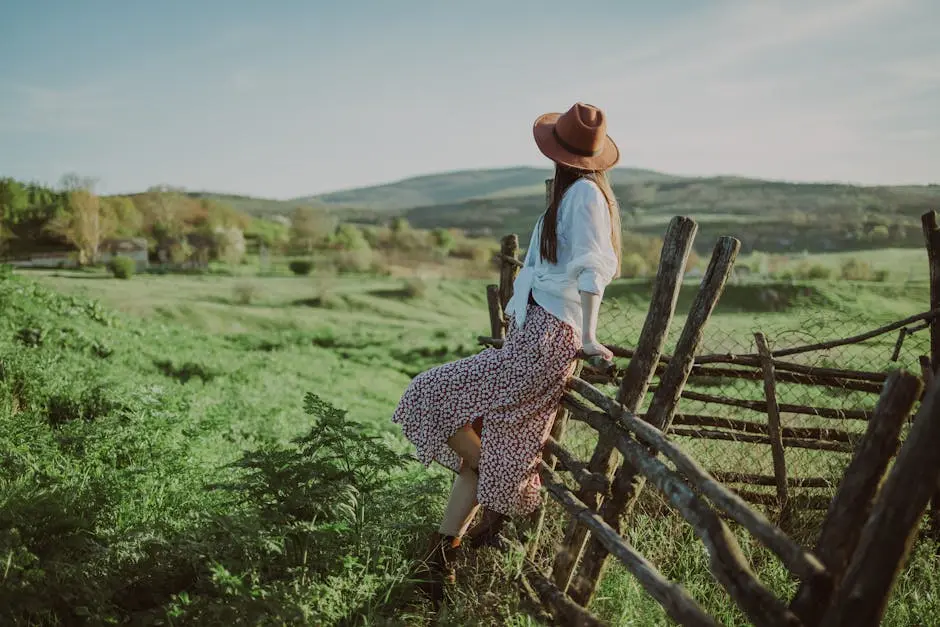 A young lady with a hat on her head.