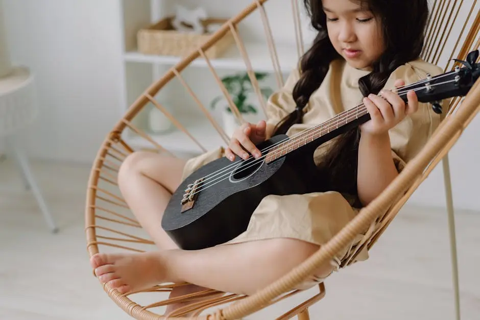 Cute Little Girl Playing Ukulele