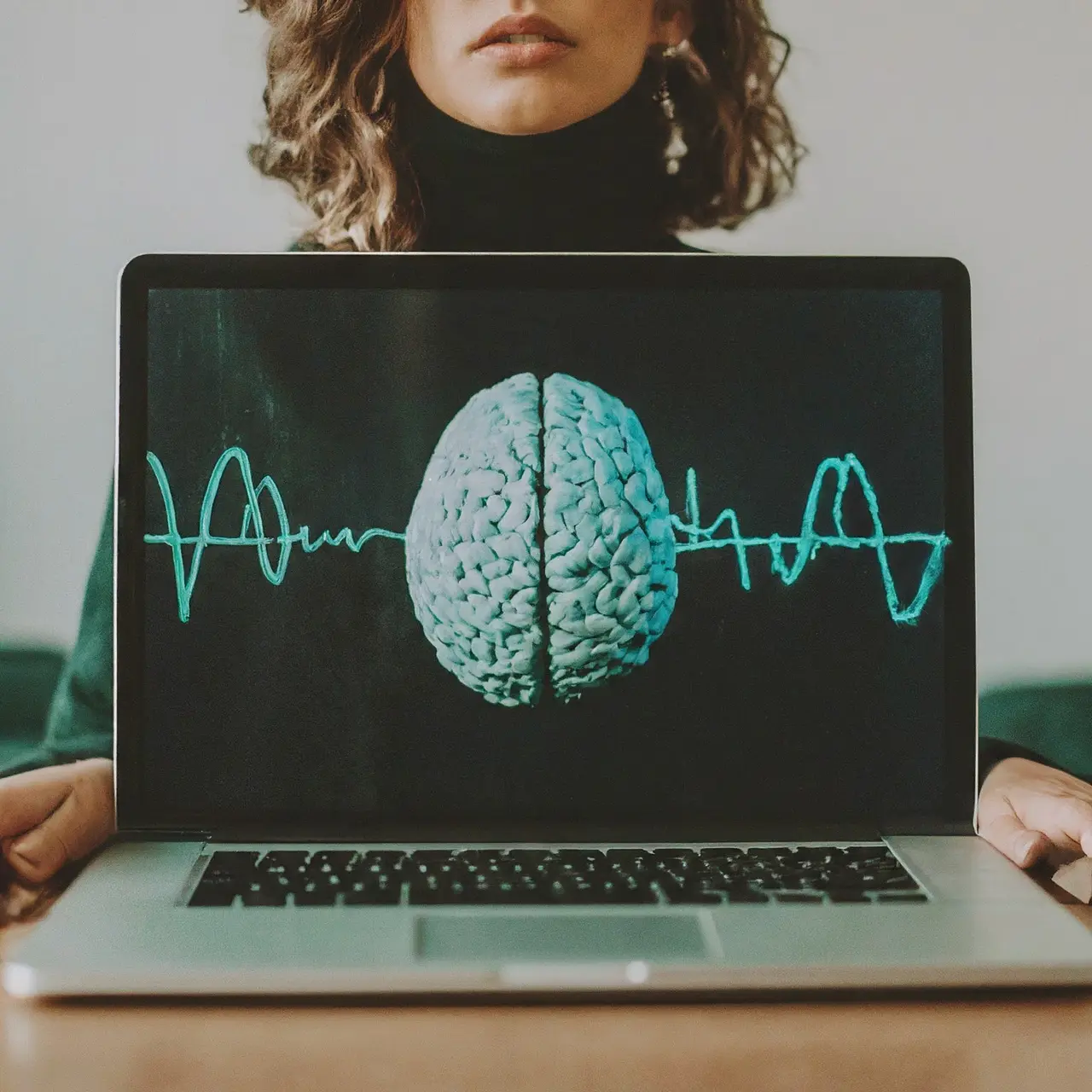 Laptop with brain waves graphic on screen 35mm stock photo