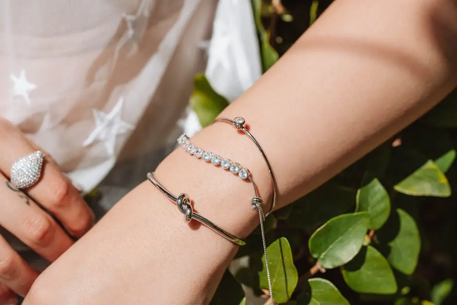 Close-Up Shot of a Person Wearing Silver Bracelets