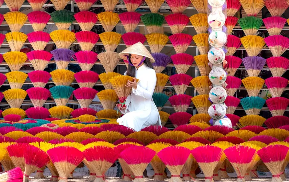 Woman Sitting at a Market Stall with Handmade Merchandise