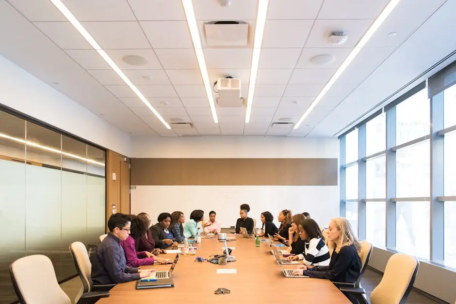 A multicultural team brainstorming and collaborating during a business meeting.