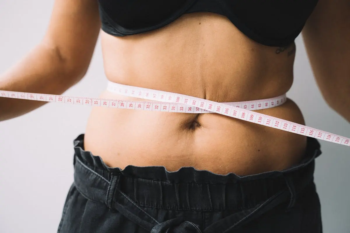 Photo of a Tape Measure on a Person’s Waist