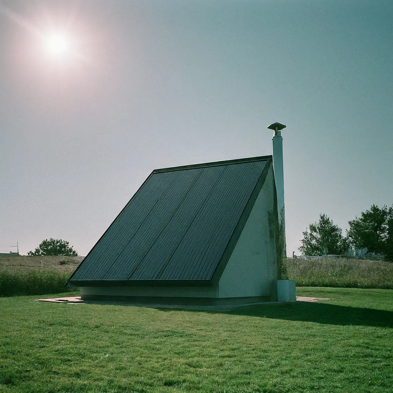 A solar-powered crematorium under a bright sun. 35mm stock photo