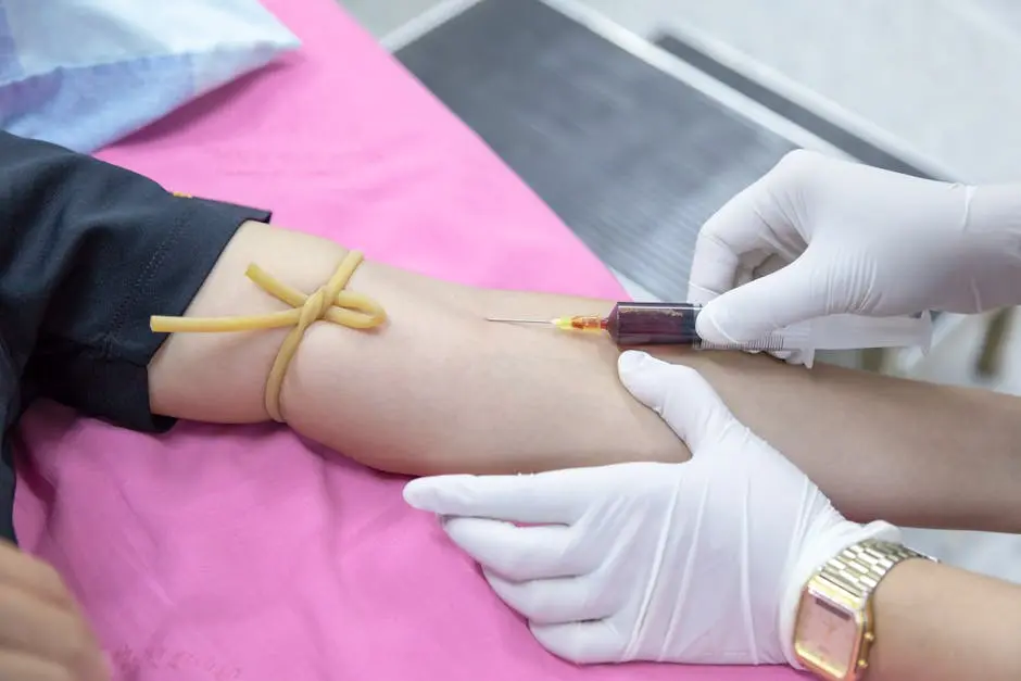 Injecting of Syringe on Person’s Arm