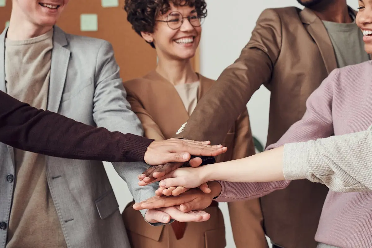 Photo Of People Holding Each Other’s hands